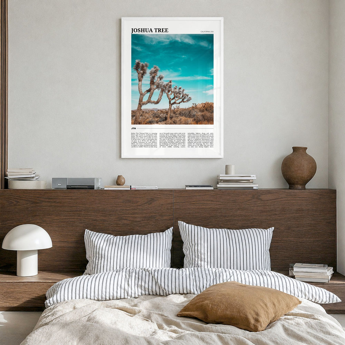 Joshua Tree National Park Travel Poster in a white wood frame, hanging in a bedroom