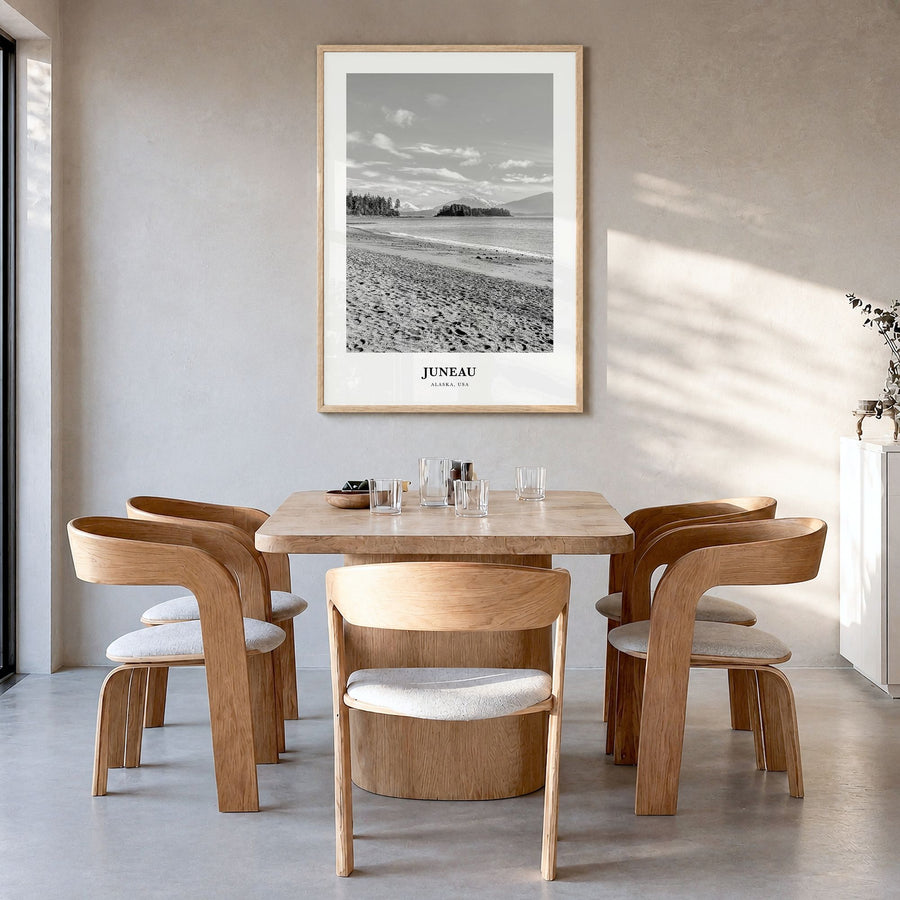 Juneau Classic No 1 Poster in a natural wood frame, hanging in a dining room