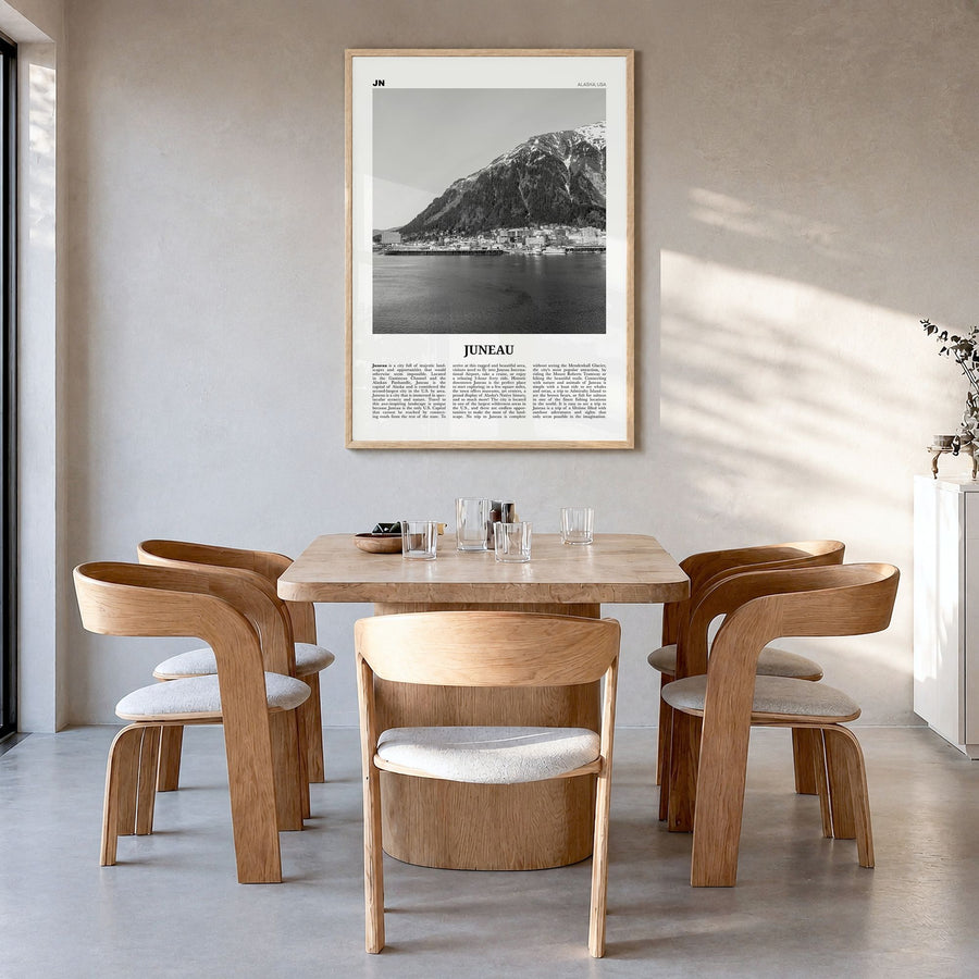 Juneau Newspaper No 1 Poster in a natural wood frame, hanging in a dining room