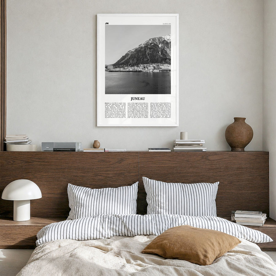 Juneau Newspaper No 1 Poster in a white wood frame, hanging in a bedroom