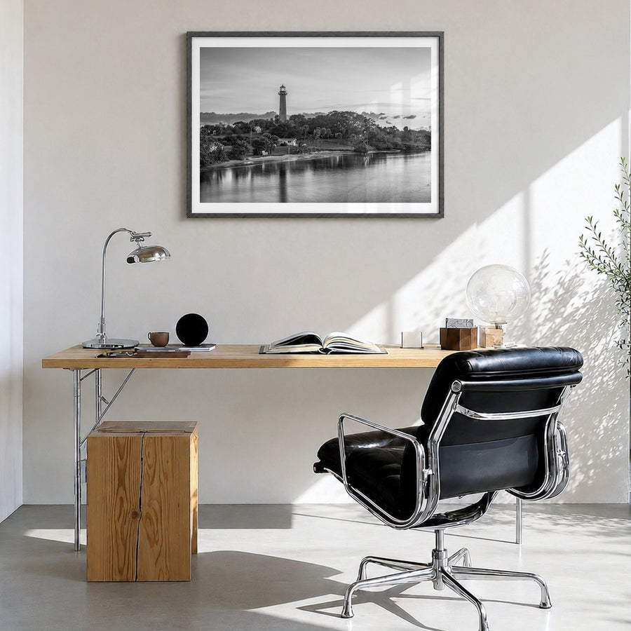 Jupiter Photo Poster in a black wood frame, hanging in a bright home office, white border