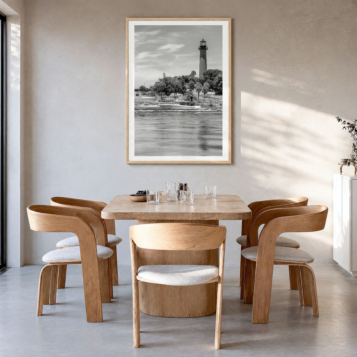 Jupiter Photo Poster in a natural wood frame, hanging in a dining room, white border