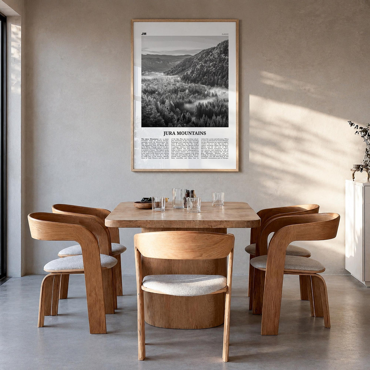 Jura Mountains black & white newspaper poster of Europe – vertical wall art in natural wood frame, hanging on wall