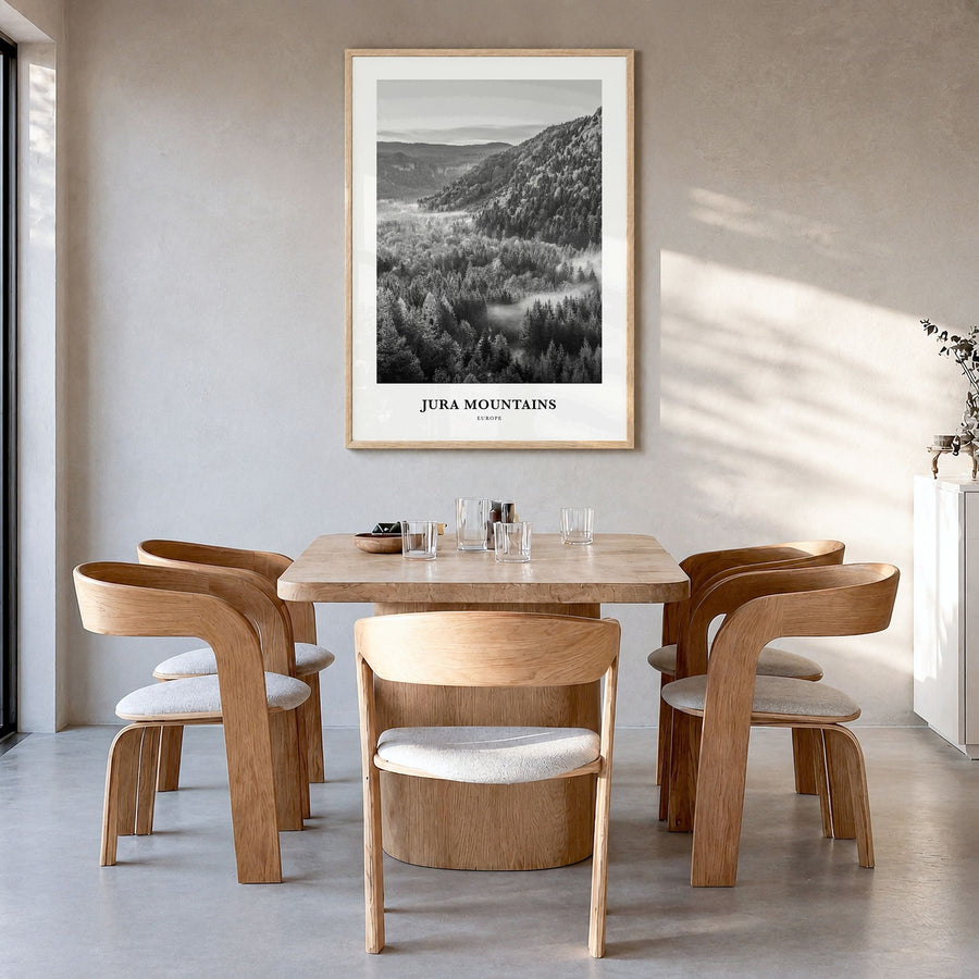 Jura Mountains Classic Poster in a natural wood frame, hanging in a dining room