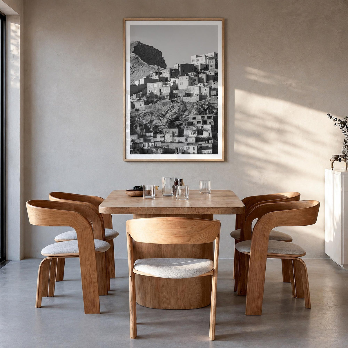Kabul black & white photo poster of Afghanistan – vertical wall art in natural wood frame with white border, hanging on wall