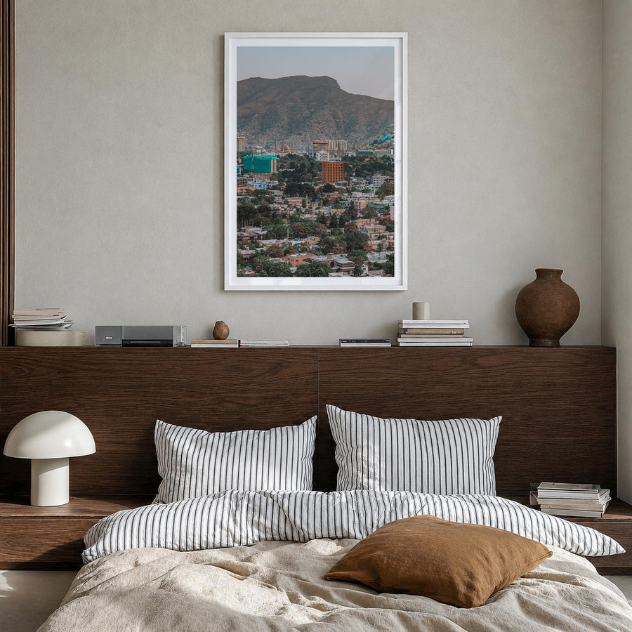 Kabul colorful photo poster of Afghanistan – vertical wall art in white wood frame with white border, hanging on wall