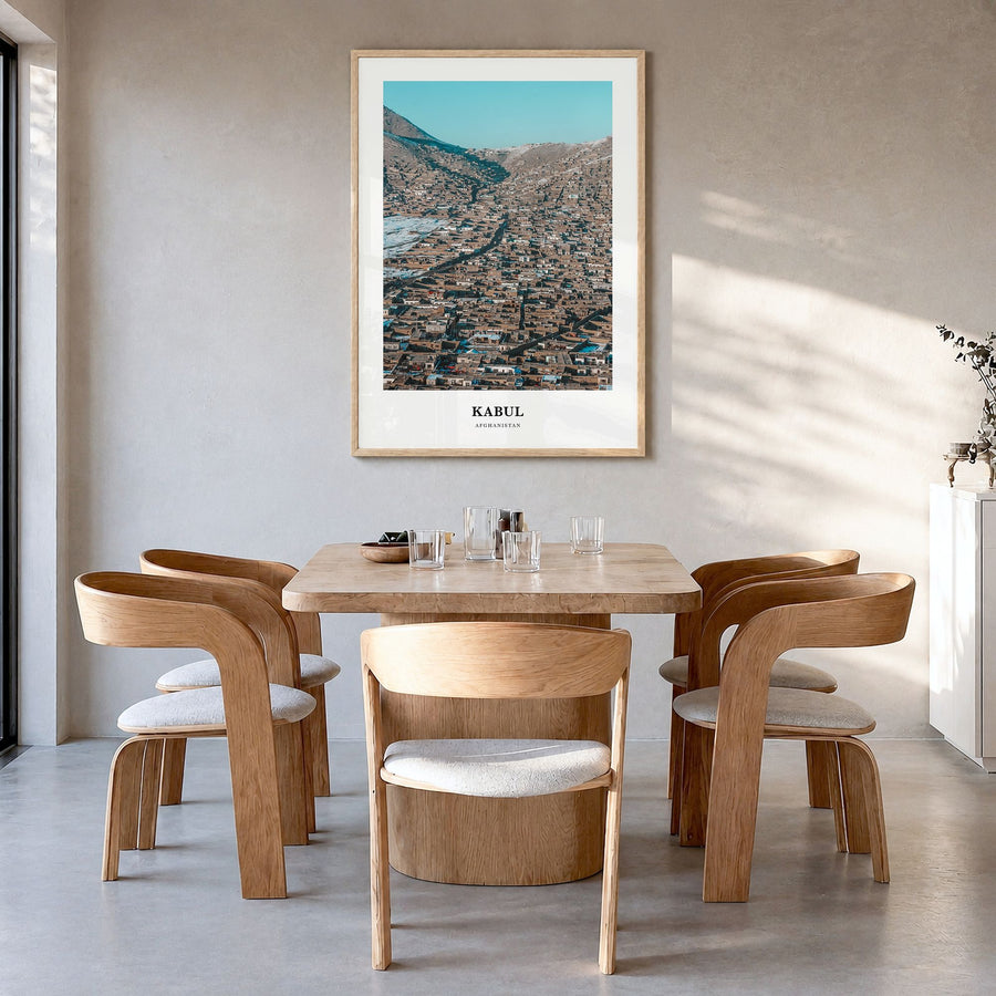 Kabul Classic Poster in a natural wood frame, hanging in a dining room