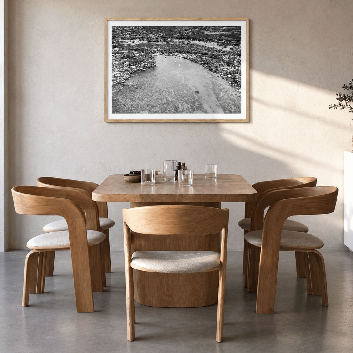 Kailua-Kona Photo Poster in a natural wood frame, hanging in a dining room, white border