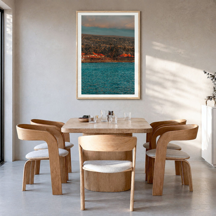 Kailua-Kona Photo No 1 Poster in a natural wood frame, hanging in a dining room, white border