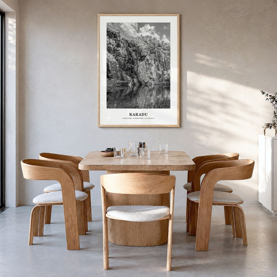 Kakadu Classic Poster in a natural wood frame, hanging in a dining room