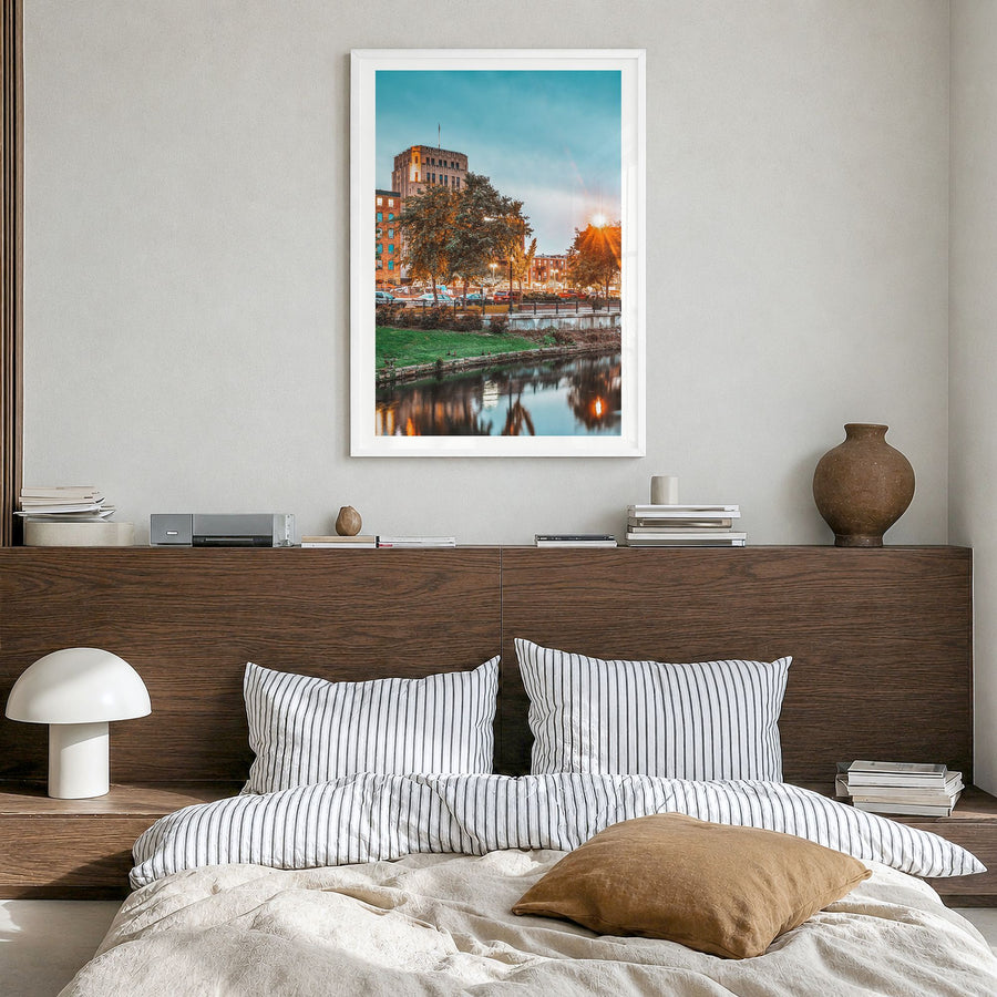 Kalamazoo Photo Poster in a white wood frame, hanging in a bedroom, white border