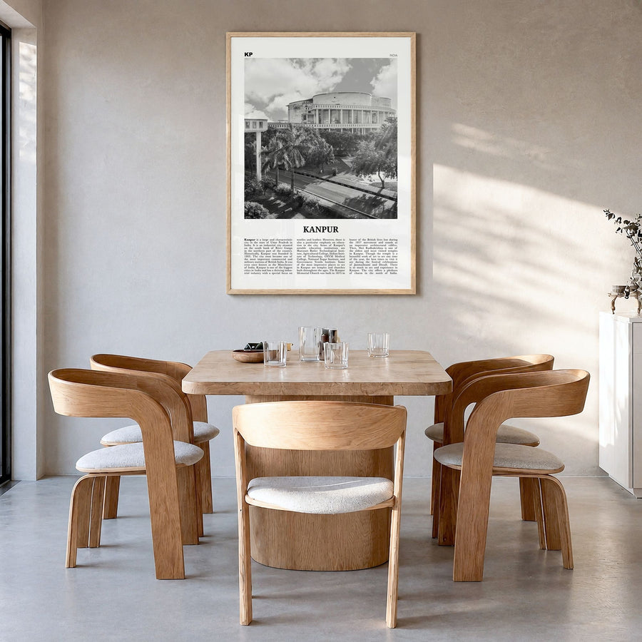 Kanpur Newspaper Poster in a natural wood frame, hanging in a dining room