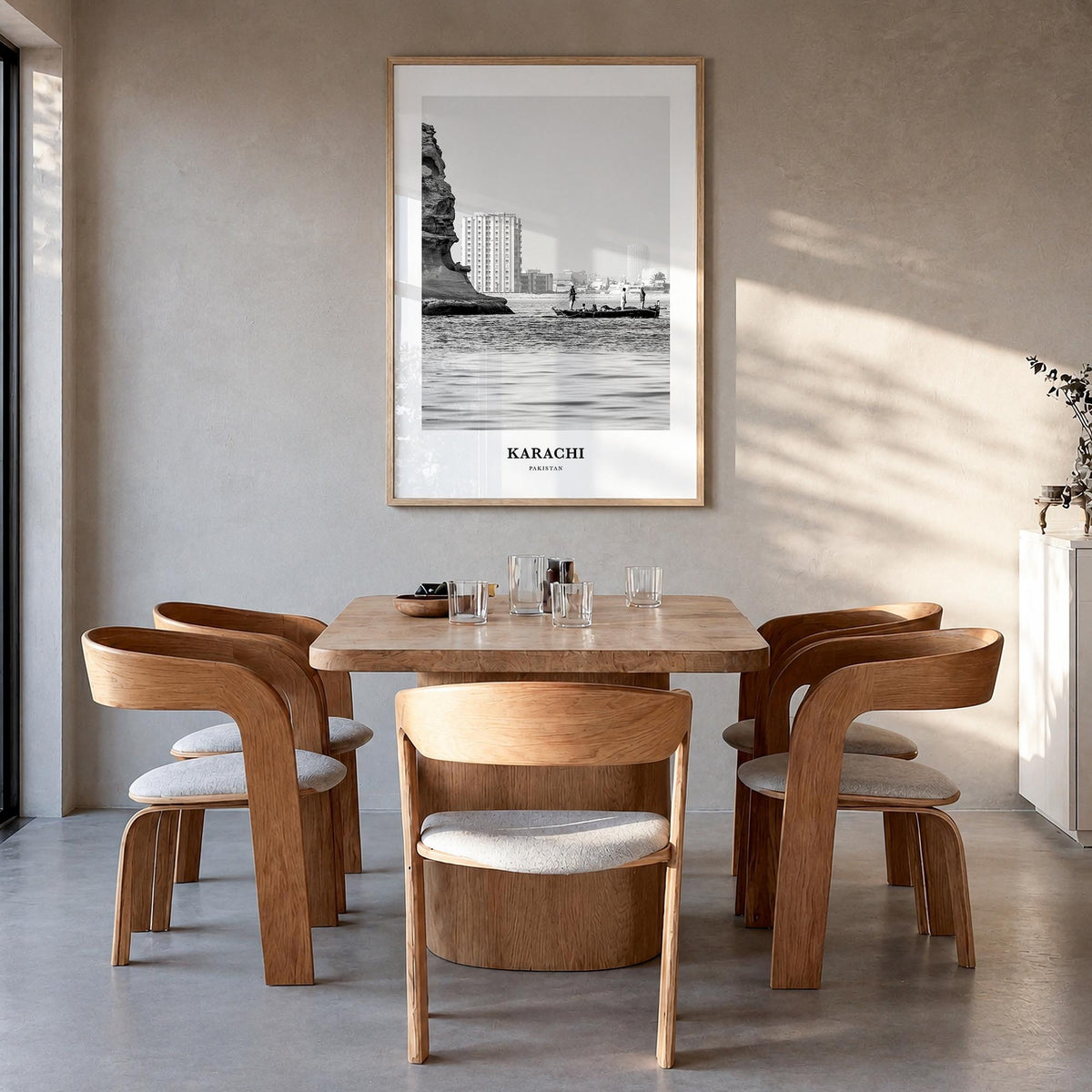 Karachi black & white classic poster of Pakistan – vertical wall art in natural wood frame, hanging on wall