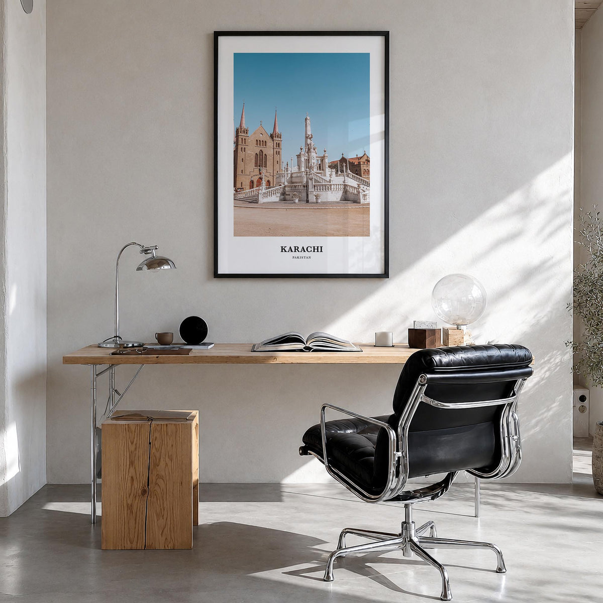 Karachi no. 1 colorful classic poster of Pakistan – vertical wall art in black wood frame, hanging on wall