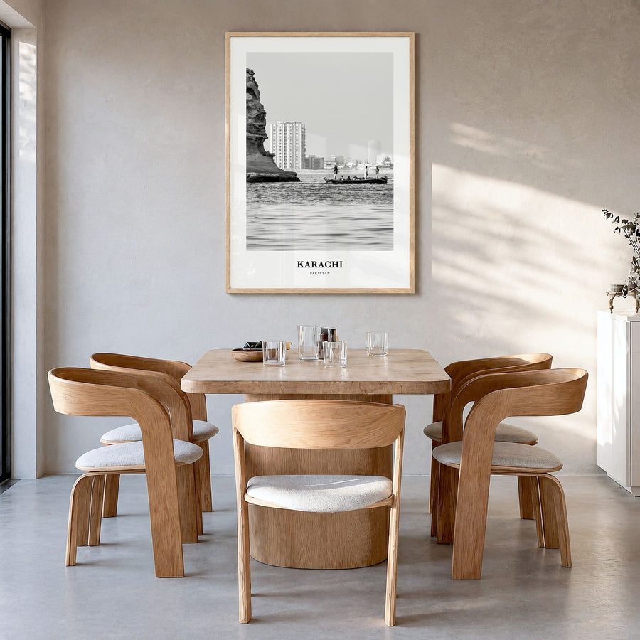 Karachi Classic Poster in a natural wood frame, hanging in a dining room