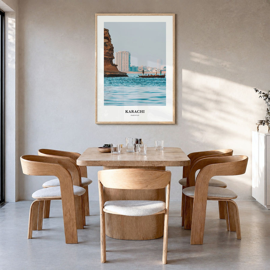 Karachi Classic No 2 Poster in a natural wood frame, hanging in a dining room