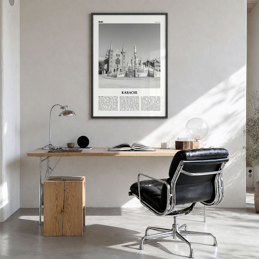Karachi Newspaper No 2 Poster in a black wood frame, hanging in a bright home office
