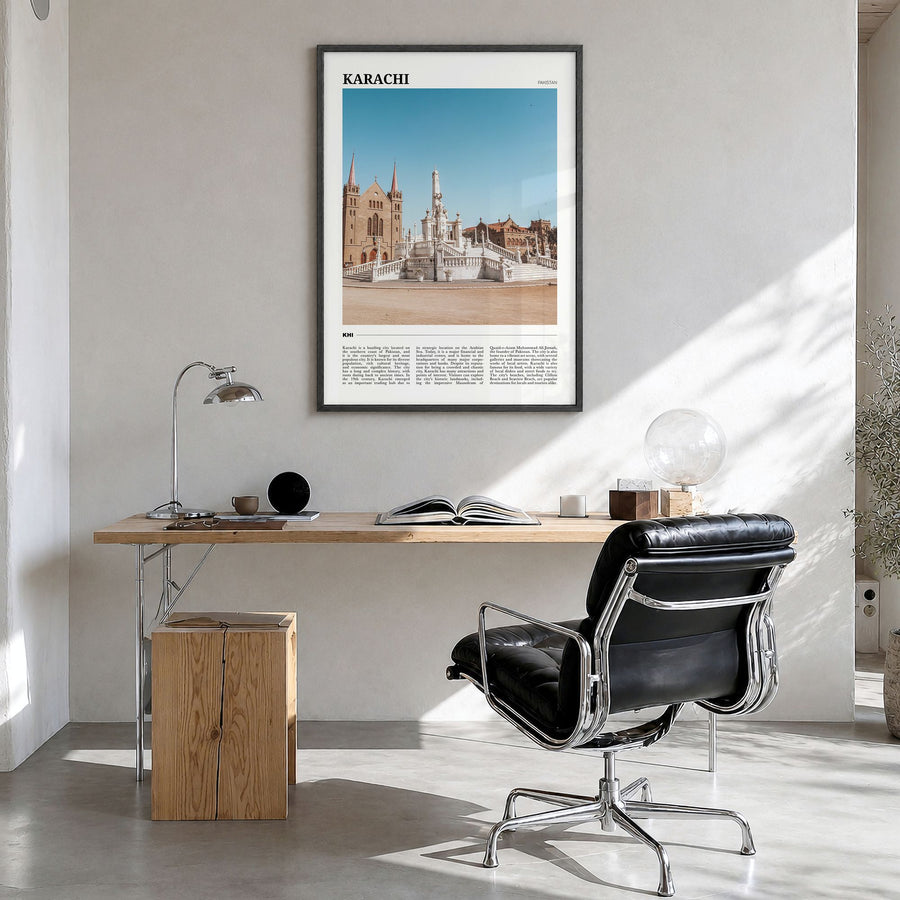Karachi Travel No 1 Poster in a black wood frame, hanging in a bright home office
