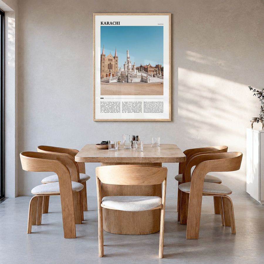 Karachi Travel No 1 Poster in a natural wood frame, hanging in a dining room