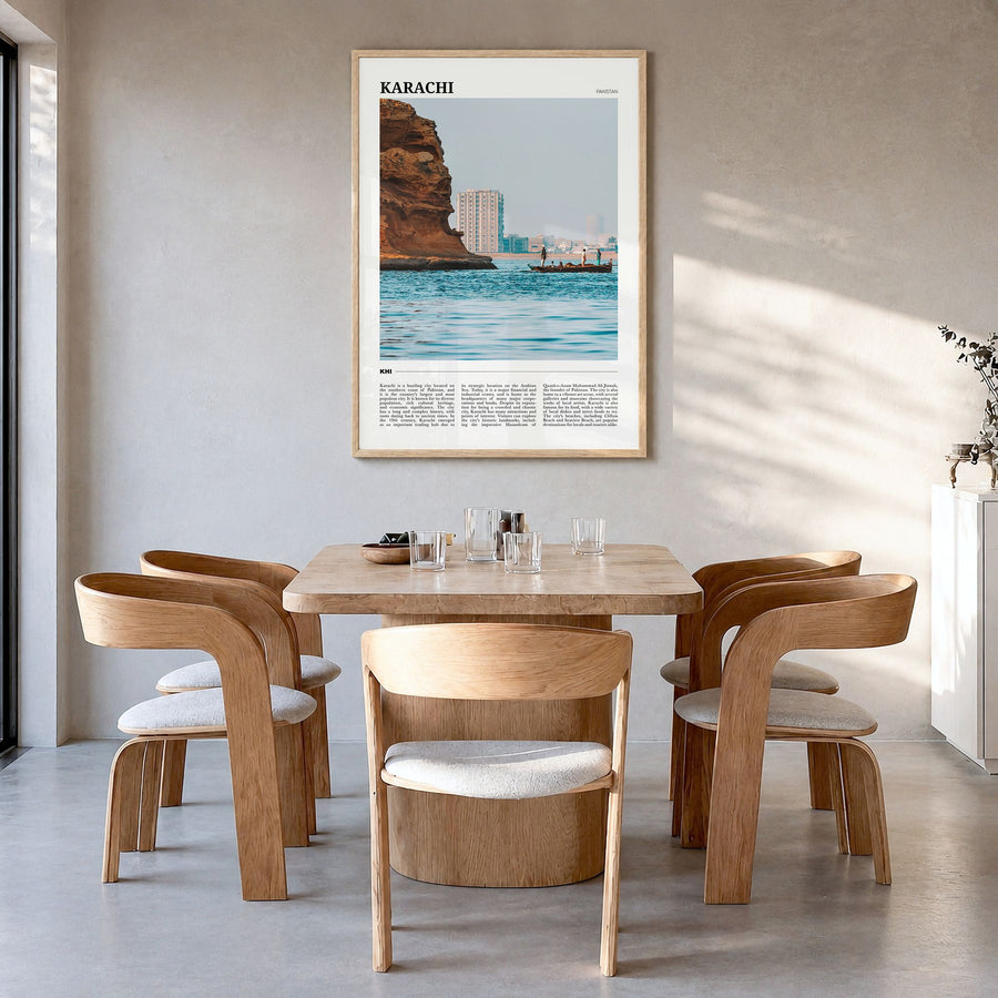 Karachi Travel No 2 Poster in a natural wood frame, hanging in a dining room