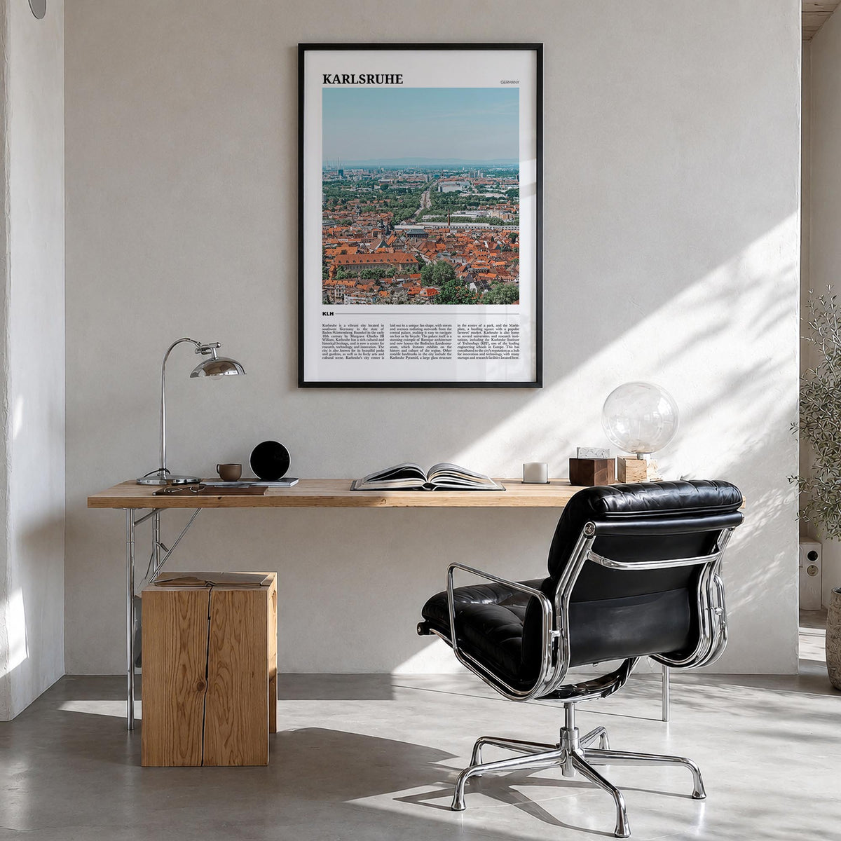 Karlsruhe colorful travel poster of Germany – vertical wall art in black wood frame, hanging on wall