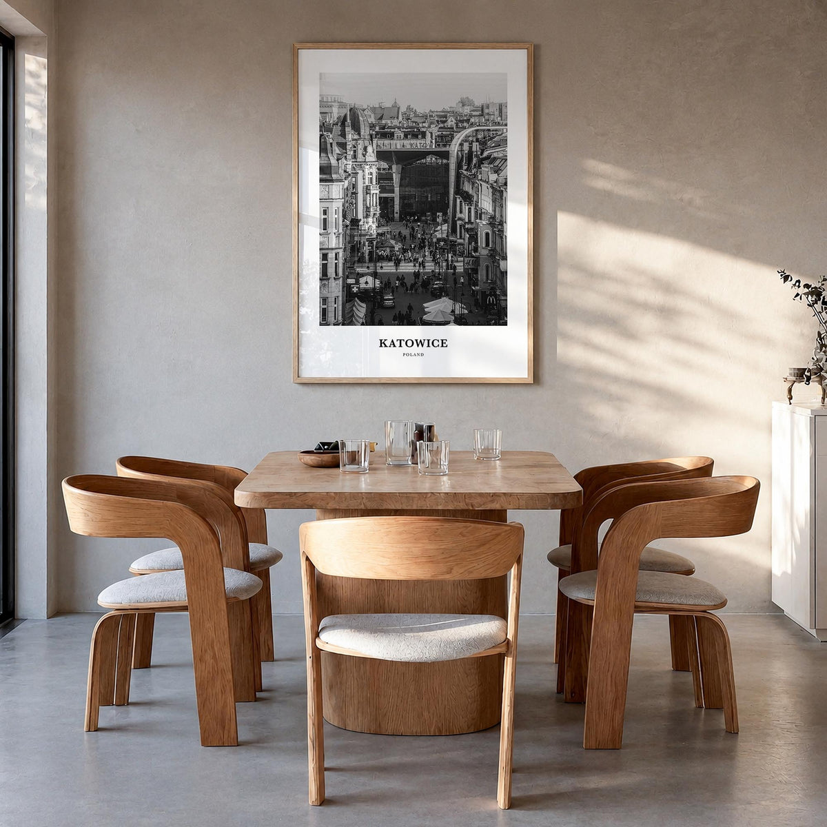 Katowice black & white classic poster of Poland – vertical wall art in natural wood frame, hanging on wall