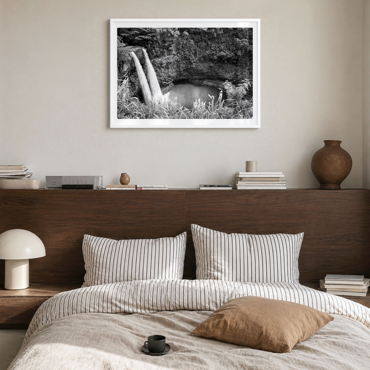 Kauai Photo Poster in a white wood frame, hanging in a bedroom, white border
