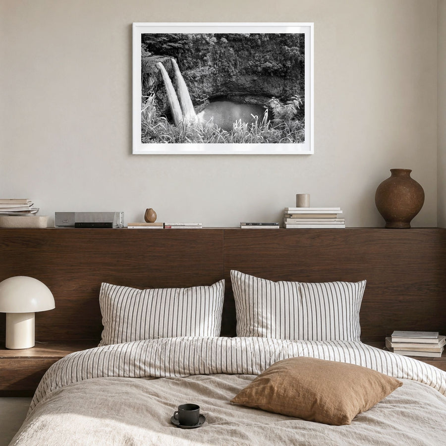 Kauai Photo Poster in a white wood frame, hanging in a bedroom, white border