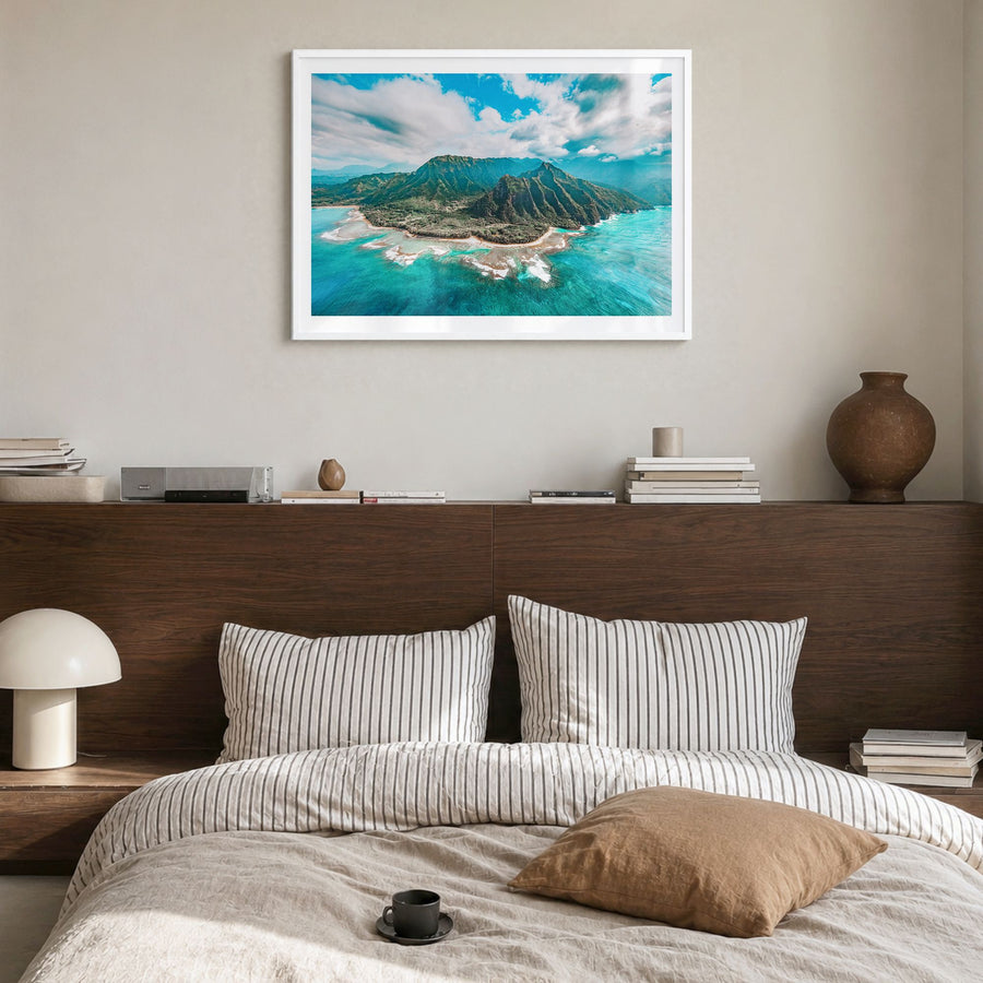 Kauai Photo Poster in a white wood frame, hanging in a bedroom, white border