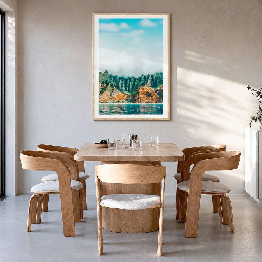 Kauai Photo No 1 Poster in a natural wood frame, hanging in a dining room, white border