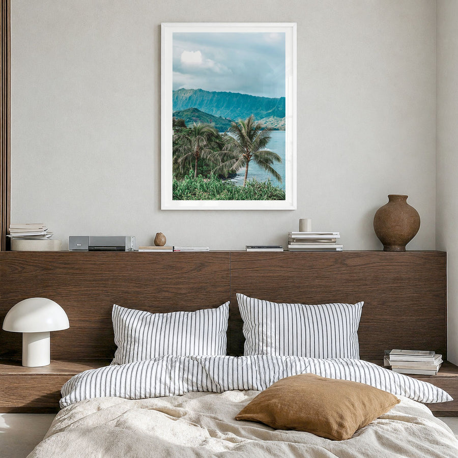 Kauai Photo No 2 Poster in a white wood frame, hanging in a bedroom, white border