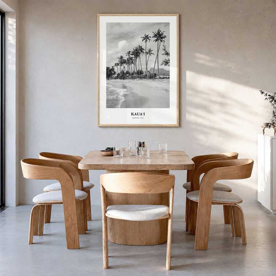 Kauai Classic No 1 Poster in a natural wood frame, hanging in a dining room