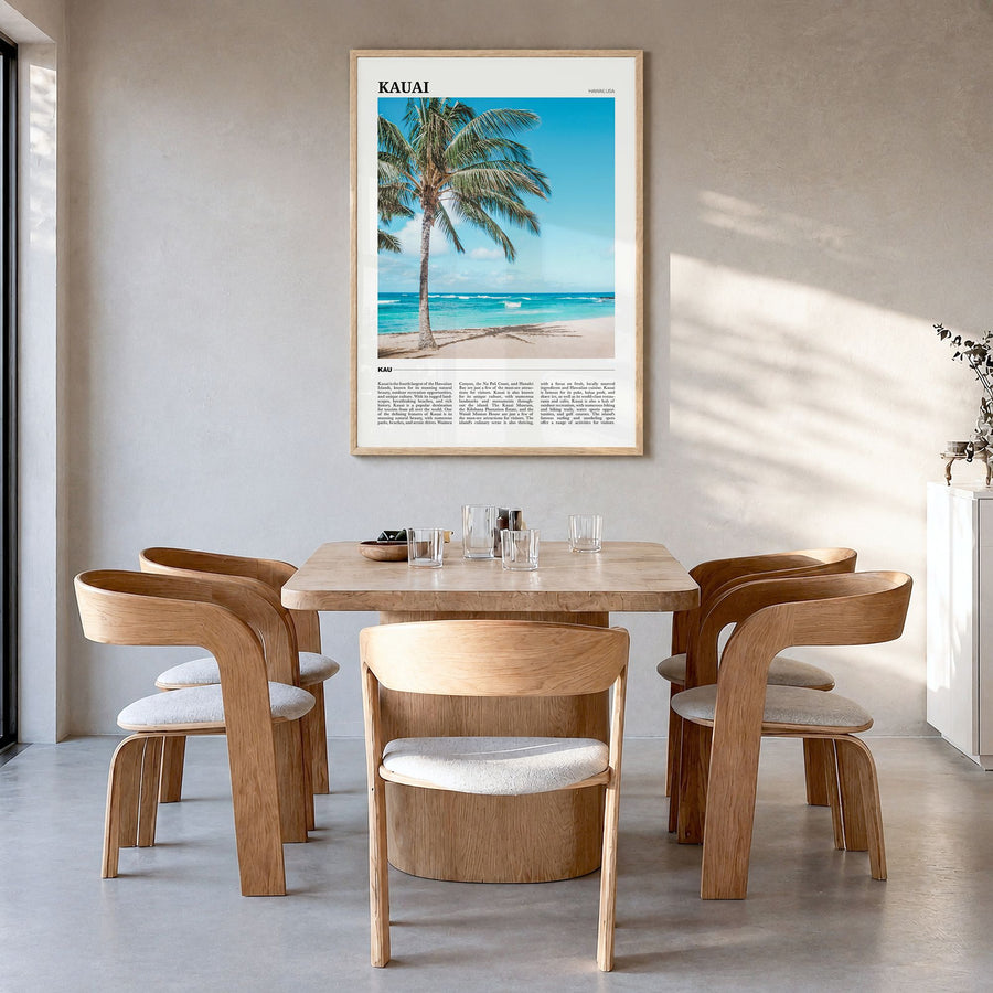 Kauai Travel No 2 Poster in a natural wood frame, hanging in a dining room
