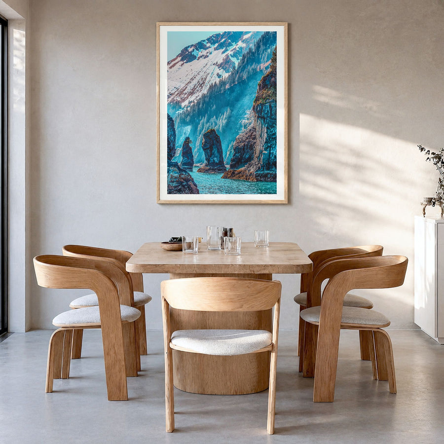 Kenai Fjords National Park Photo Poster in a natural wood frame, hanging in a dining room, white border