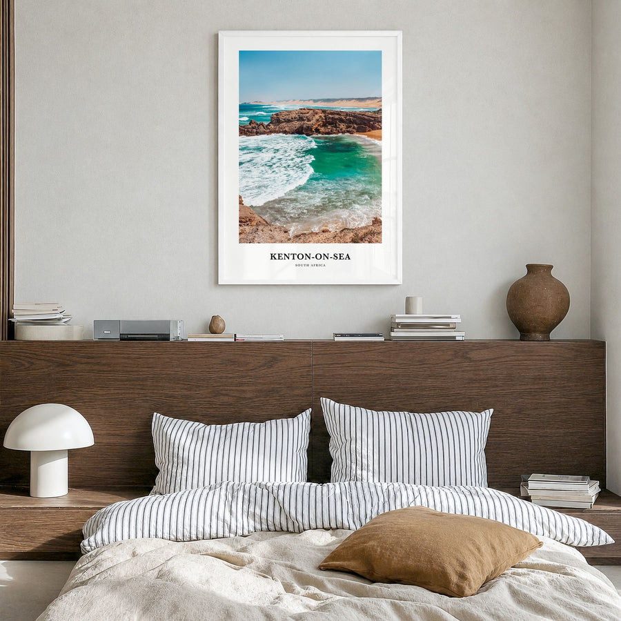 Kenton-on-Sea Classic Poster in a white wood frame, hanging in a bedroom