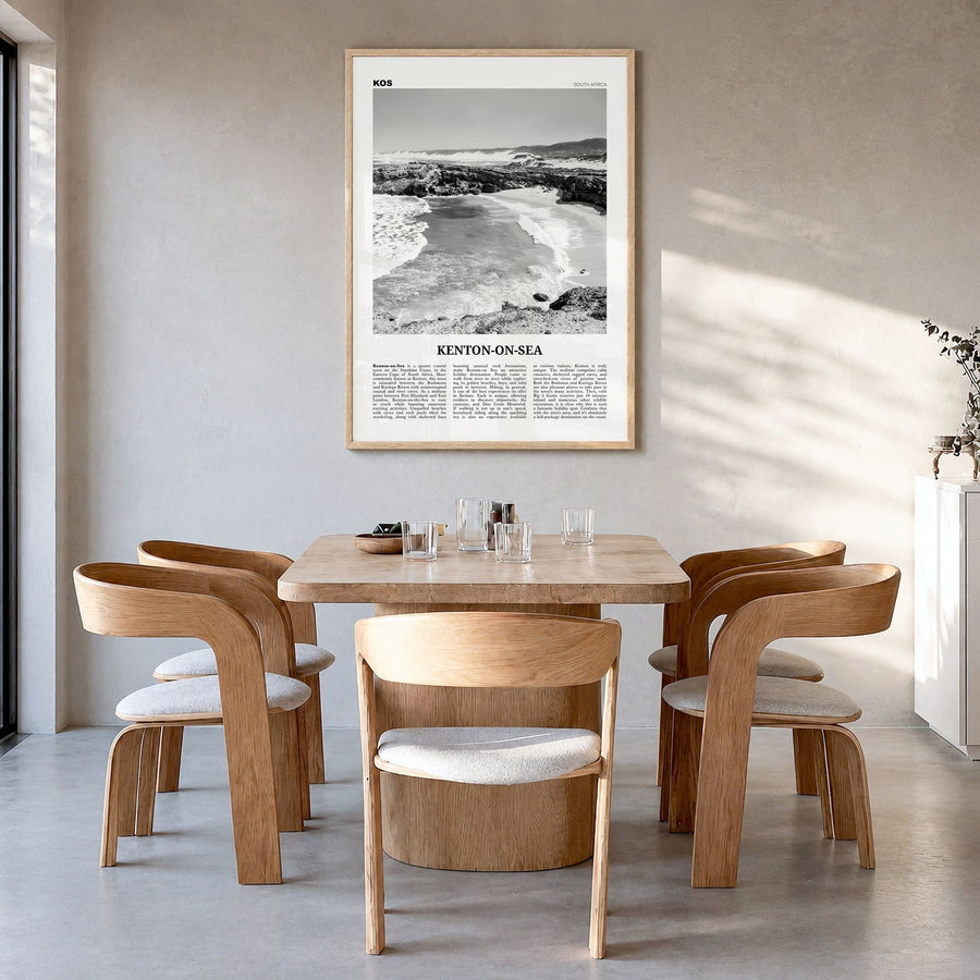 Kenton-on-Sea Newspaper Poster in a natural wood frame, hanging in a dining room