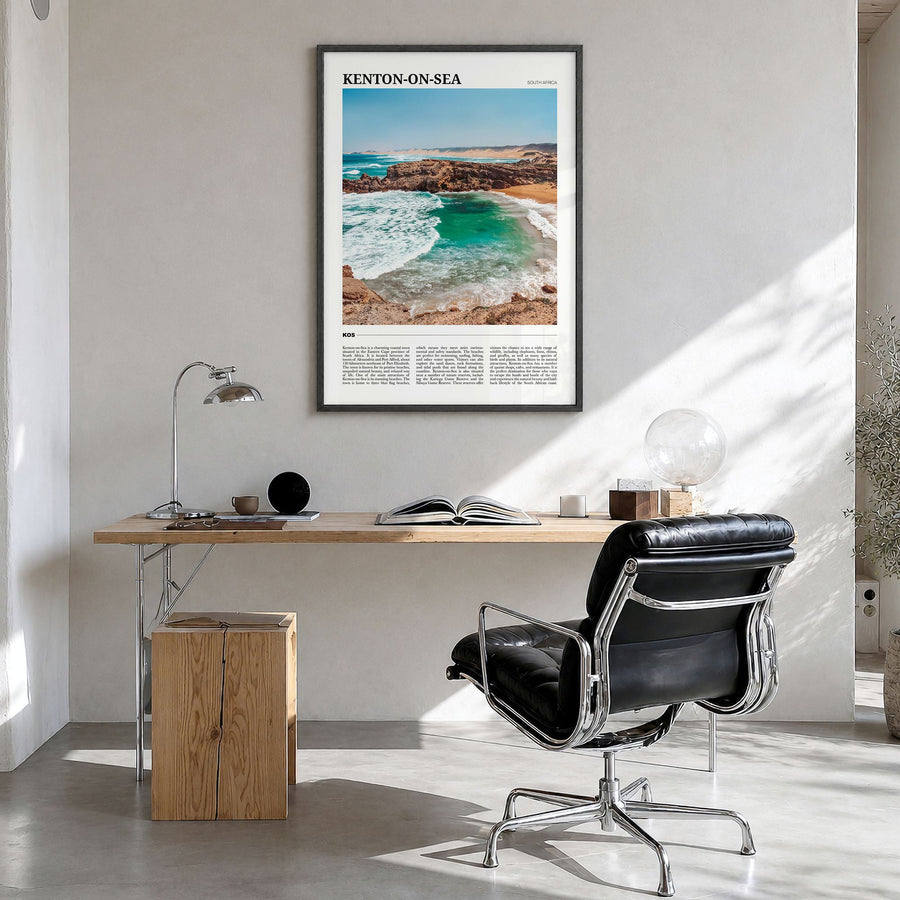 Kenton-on-Sea Travel Poster in a black wood frame, hanging in a bright home office
