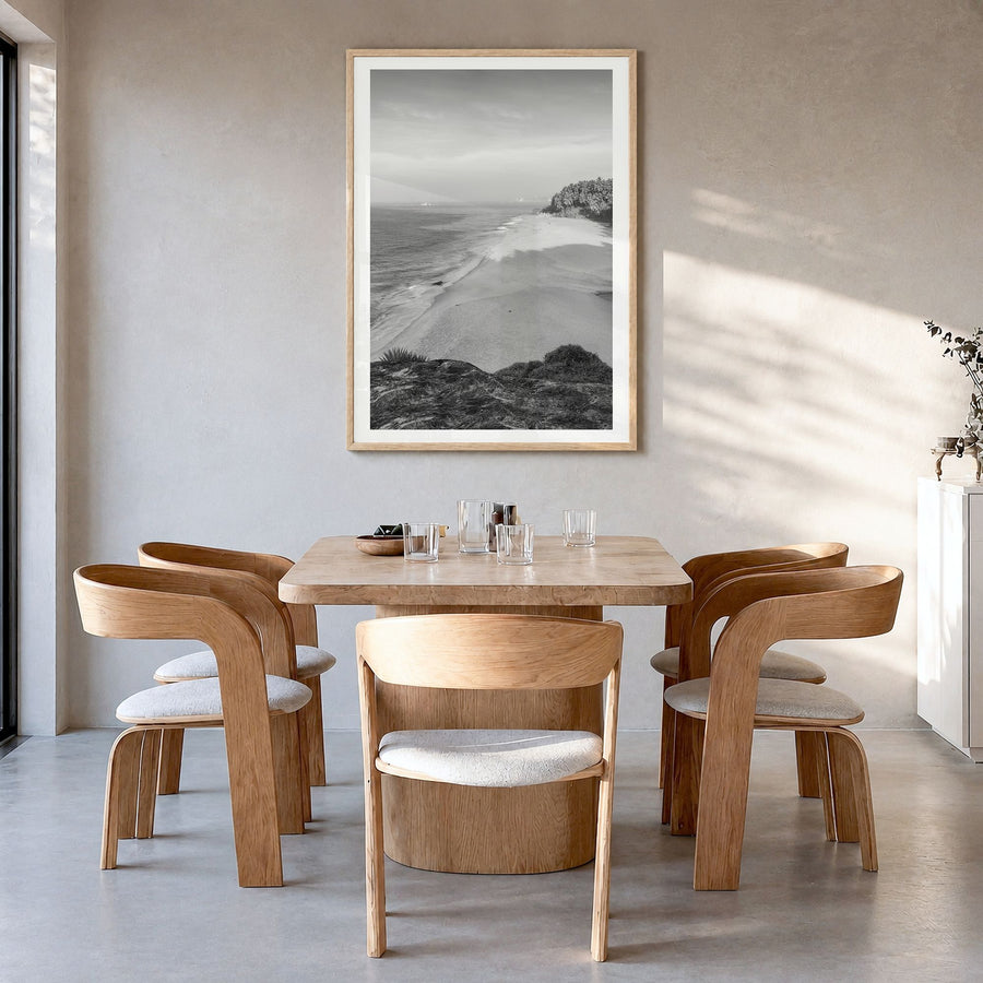 Kerala Photo Poster in a natural wood frame, hanging in a dining room, white border
