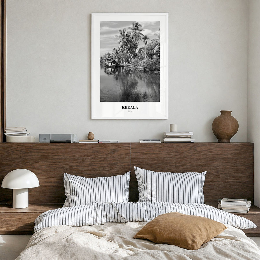 Kerala Classic Poster in a white wood frame, hanging in a bedroom