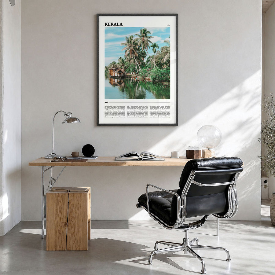 Kerala Travel Poster in a black wood frame, hanging in a bright home office