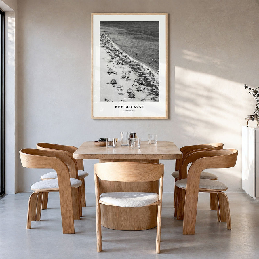 Key Biscayne Classic Poster in a natural wood frame, hanging in a dining room