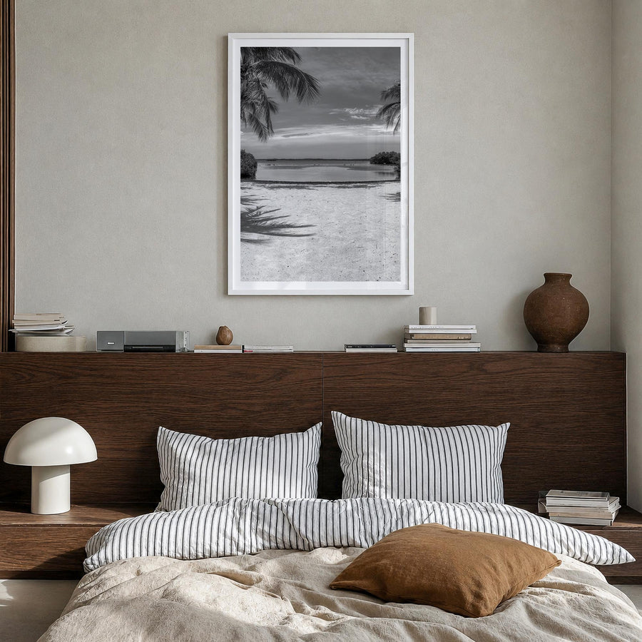 Key Largo black & white photo poster of Florida, USA – vertical wall art in white wood frame with white border, hanging on wa