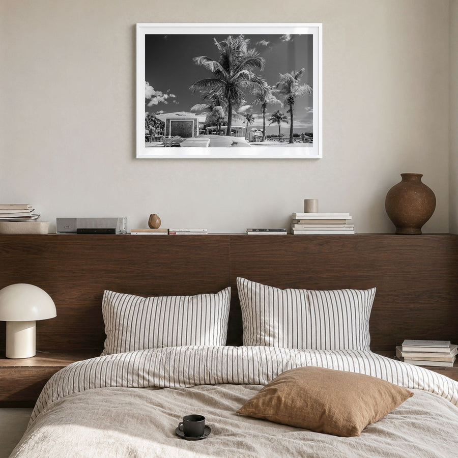 Key West Photo Poster in a white wood frame, hanging in a bedroom, white border