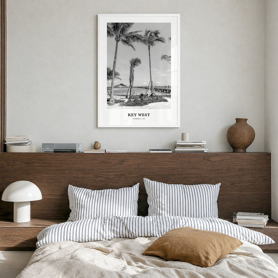 Key West Classic No 1 Poster in a white wood frame, hanging in a bedroom