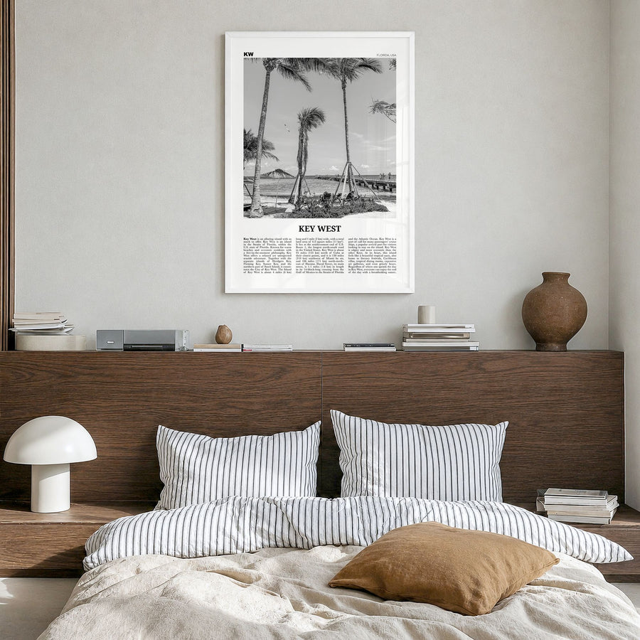 Key West Newspaper No 1 Poster in a white wood frame, hanging in a bedroom