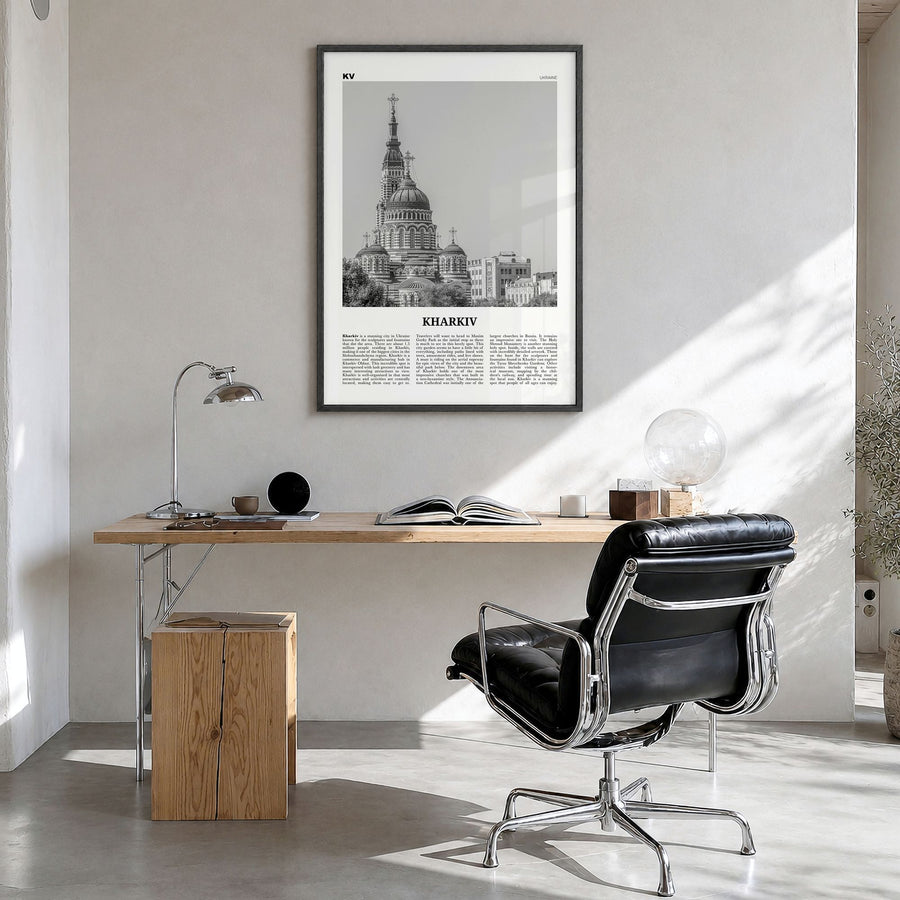 Kharkiv Newspaper Poster in a black wood frame, hanging in a bright home office