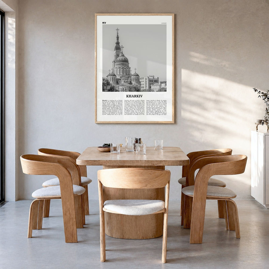Kharkiv Newspaper Poster in a natural wood frame, hanging in a dining room