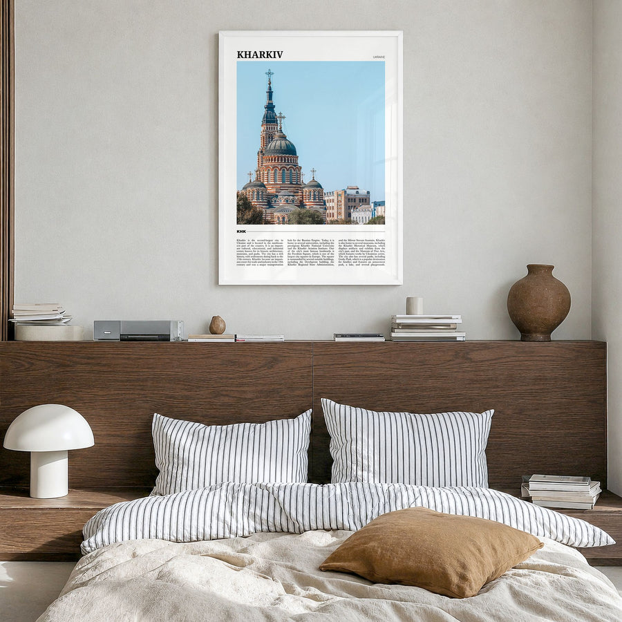 Kharkiv Travel Poster in a white wood frame, hanging in a bedroom