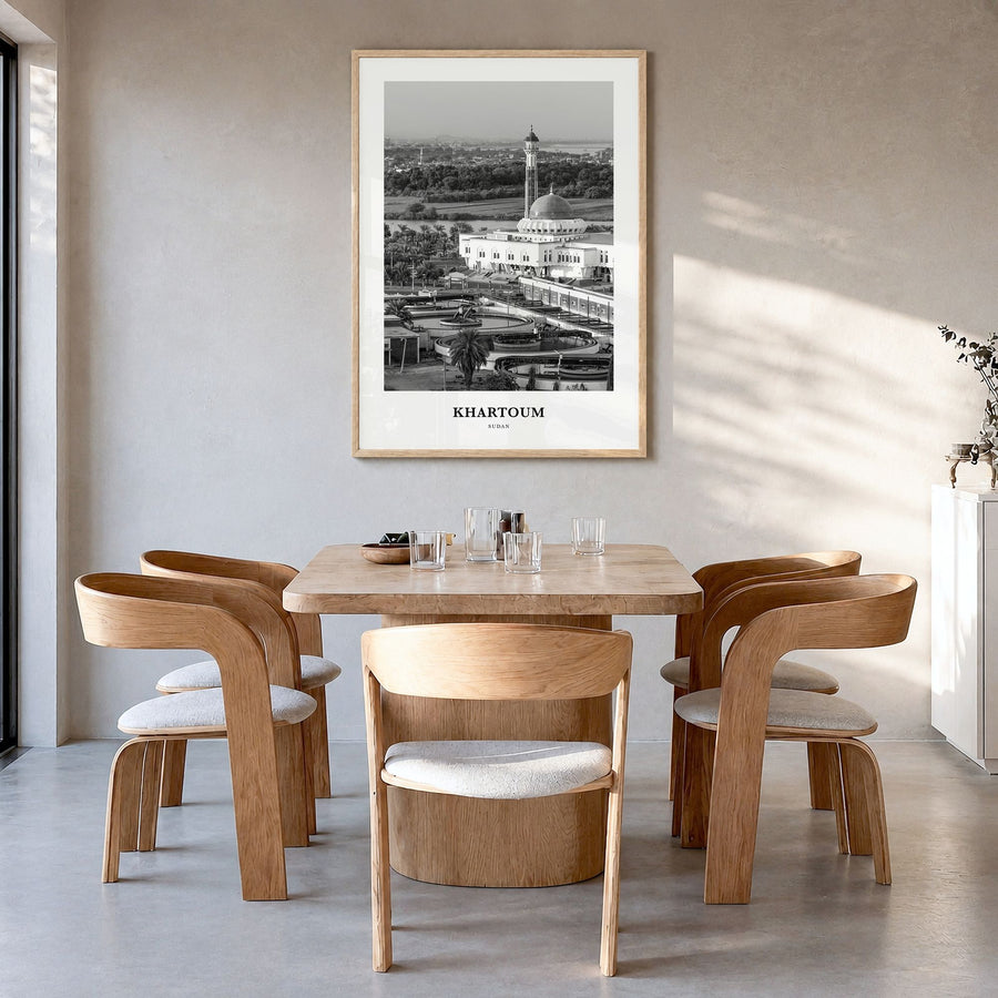 Khartoum Classic Poster in a natural wood frame, hanging in a dining room