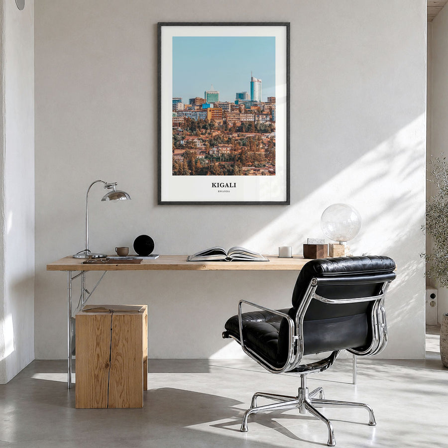 Kigali Classic Poster in a black wood frame, hanging in a bright home office